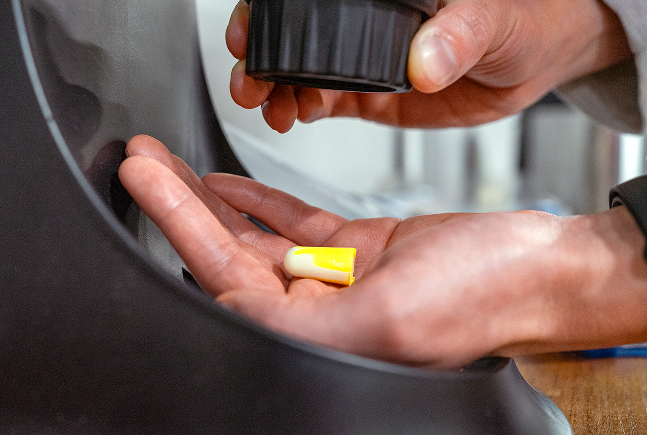 A dispenser of protective earplugs.